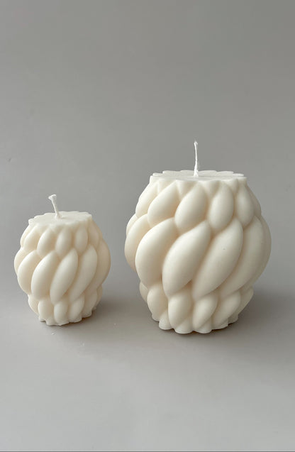 Two knitted candles